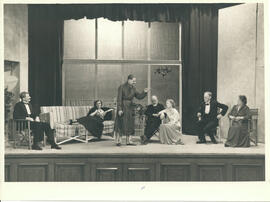 Unnamed play J, seven cast members large window and stage front, [no date].